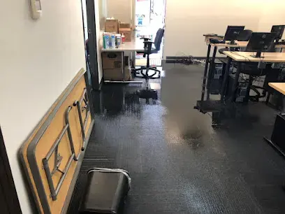 Standing water across the floor of a Lake Elsinore office