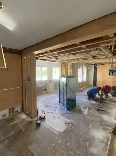 Ceiling and walls opened to the framing during water damage repairs in Lake Elsinore